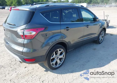 2017 Ford Escape Titanium z USA, uszkodzony, nr VIN 1FMCU9JD2HUA17583